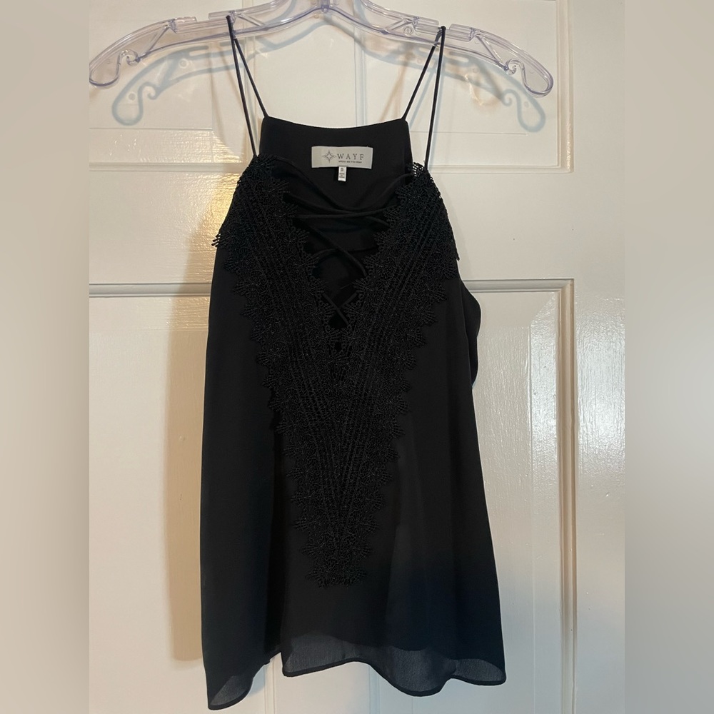 Sexy black spaghetti strap top. Chest is pretty exposed.